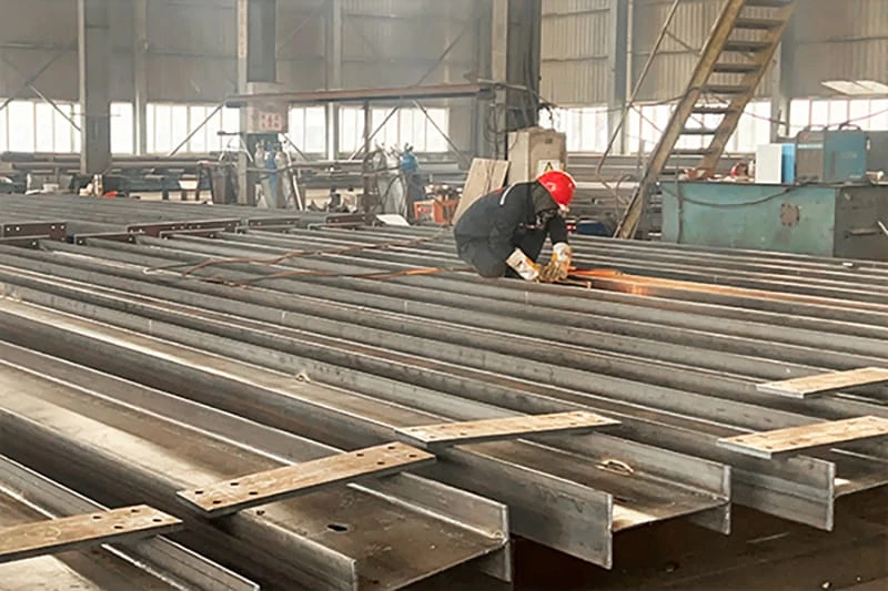 Comparison Between Welded and Hot-Rolled H-Beams in Structural Applications